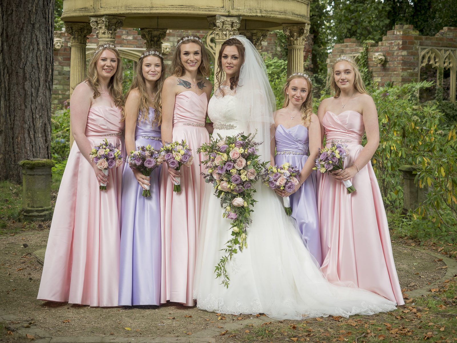Bride and bridesmaids in gowns by Brides of Bond Street, Leicester